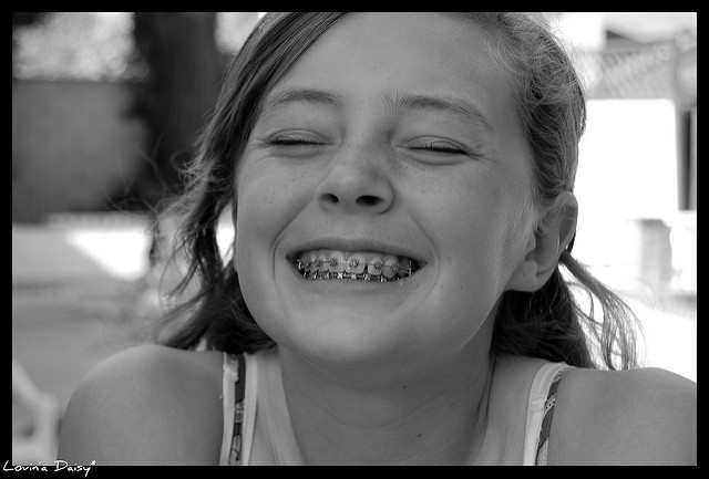 young girl with braces