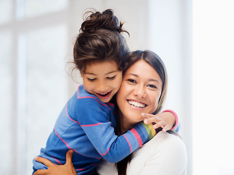 happy mother and daughter