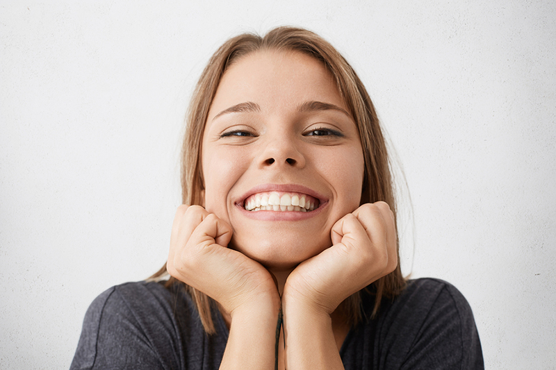 smiling woman with a big smile