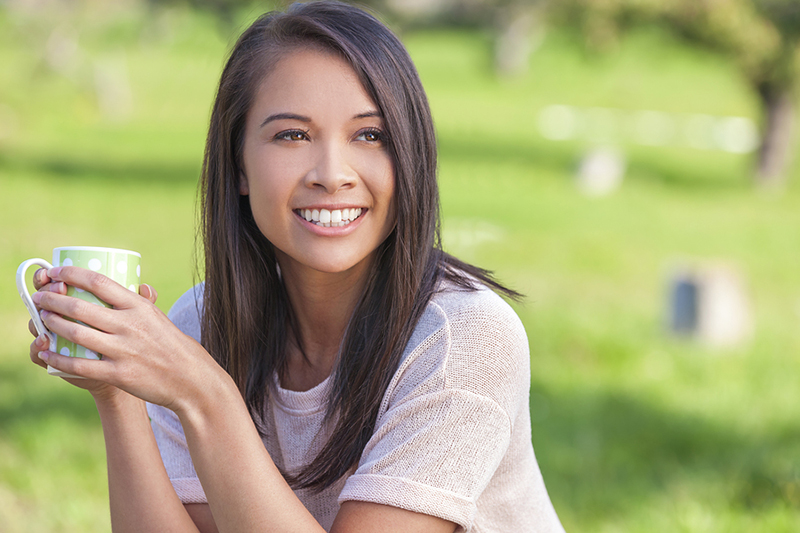 smiling woman & drinking coffee